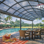 Outdoor hotel picnic and dining area with Lotus polycarbonate roofing providing UV protection, natural light, and weather resistance.