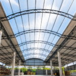 Lotus Roofings Polycarbonate Roofing Sheets installed on a modern commercial building, providing natural daylight, durability and long-term cost savings.