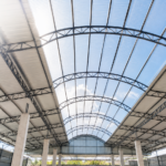 Lotus Roofings Polycarbonate Roofing Sheets installed on a modern commercial building, providing natural daylight, durability and long-term cost savings.